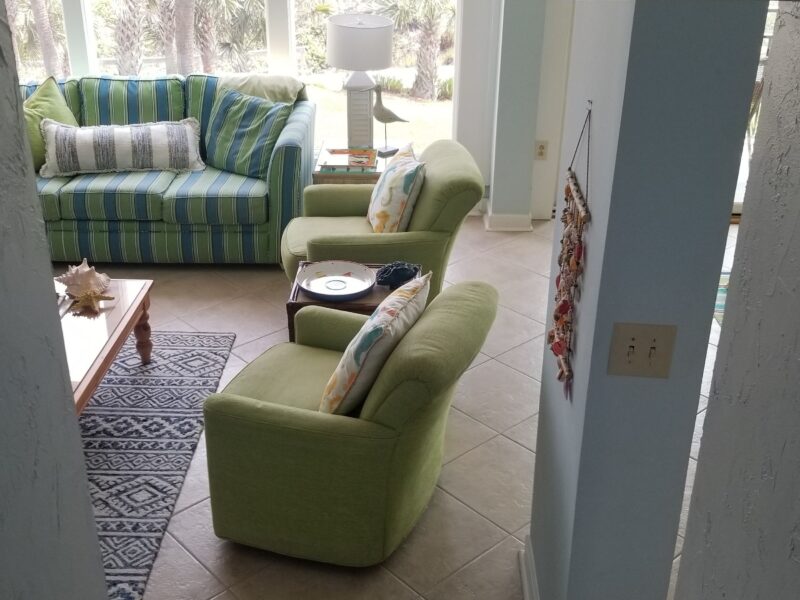 looking down into living room from foyer area at entrance